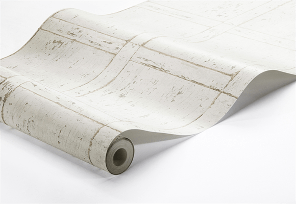 rolls of beige vintage wallpaper that looks like panels