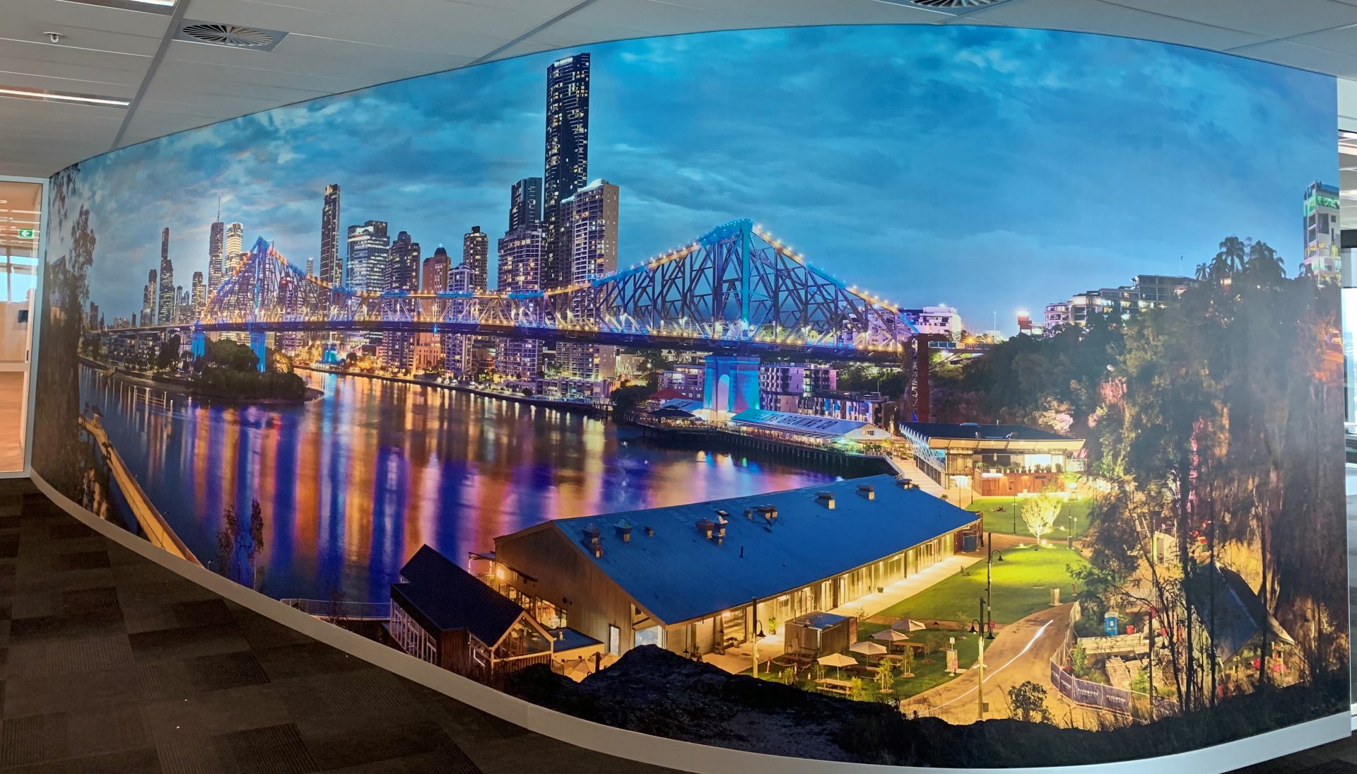 Custom mural of Story Bridge Brisbane in an office on a curved entry wall