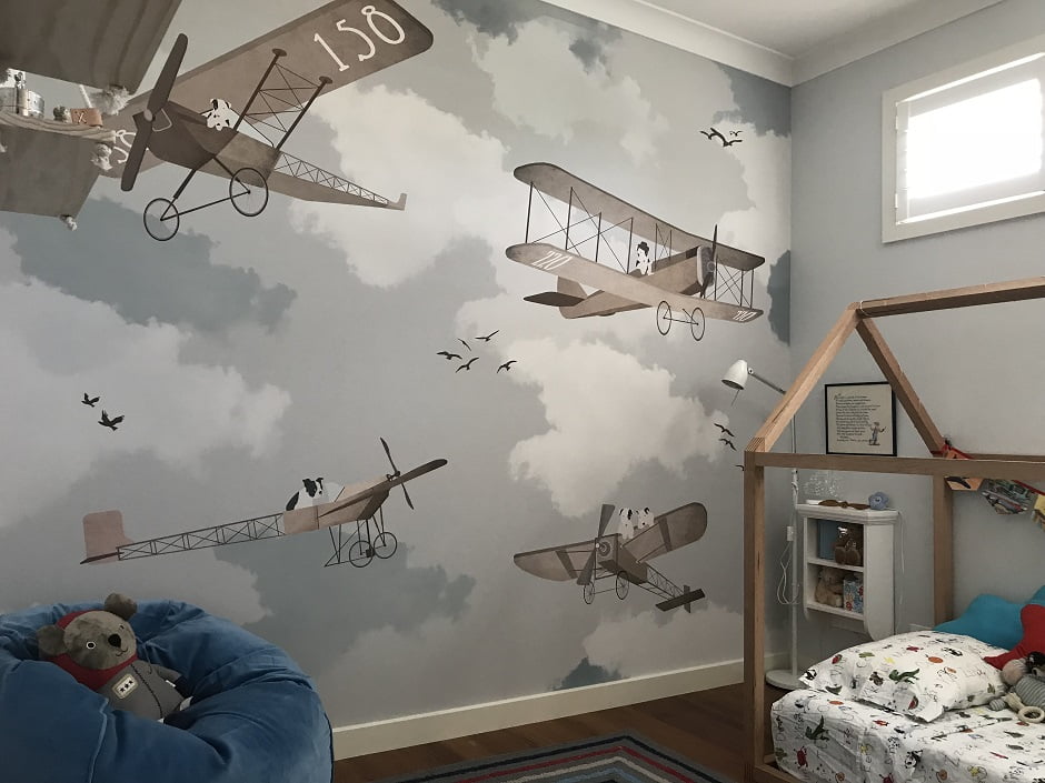 kids vintage aeroplane wallpaper in a childs bedroom