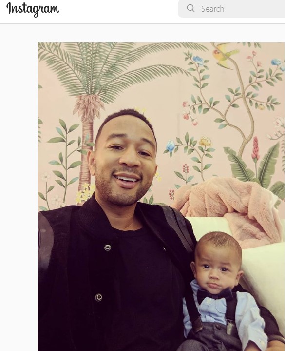 John Legend Instagram post in front of De Gournay wallpaper