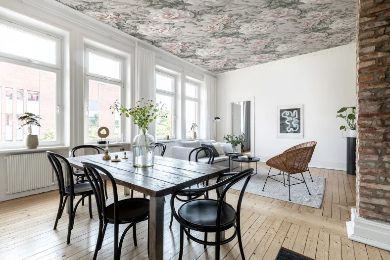 Rebelwalls Nude Roses mural on ceiling of dining room