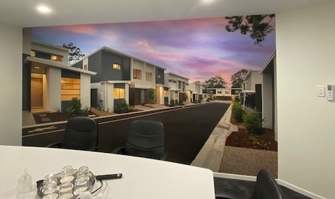 Custom commercial mural in an office of a builder