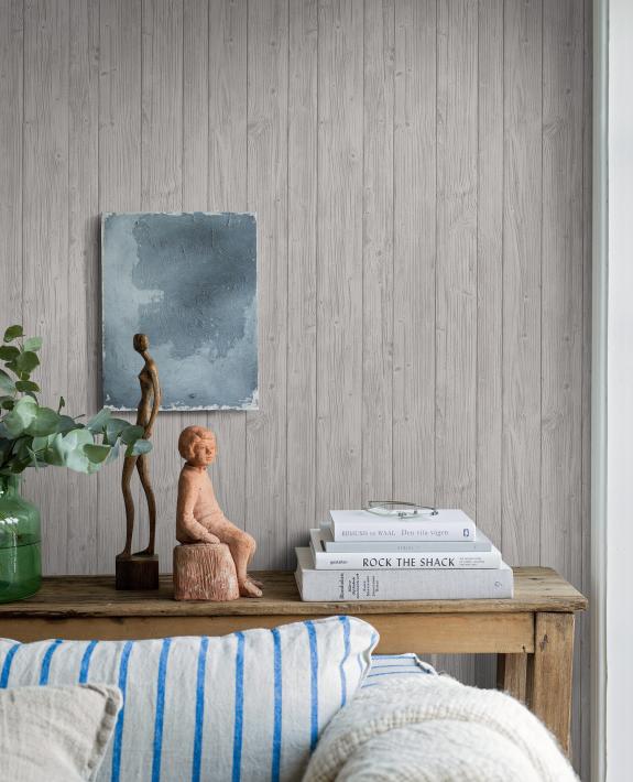 Driftwood timber effect wallpaper seen here in a lounge room