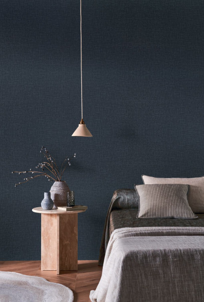 Filin Casamance wallpaper in navy for a relaxing bedroom decorating idea with natural accents