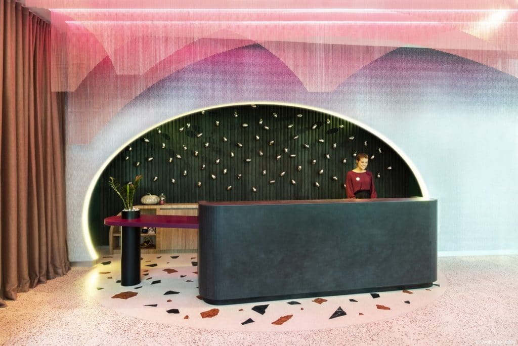 Lobby hotel wallpaper Ovolo The Valley Silver wallpaper surrounds and individually wallpapered curves in "The Egg" wall