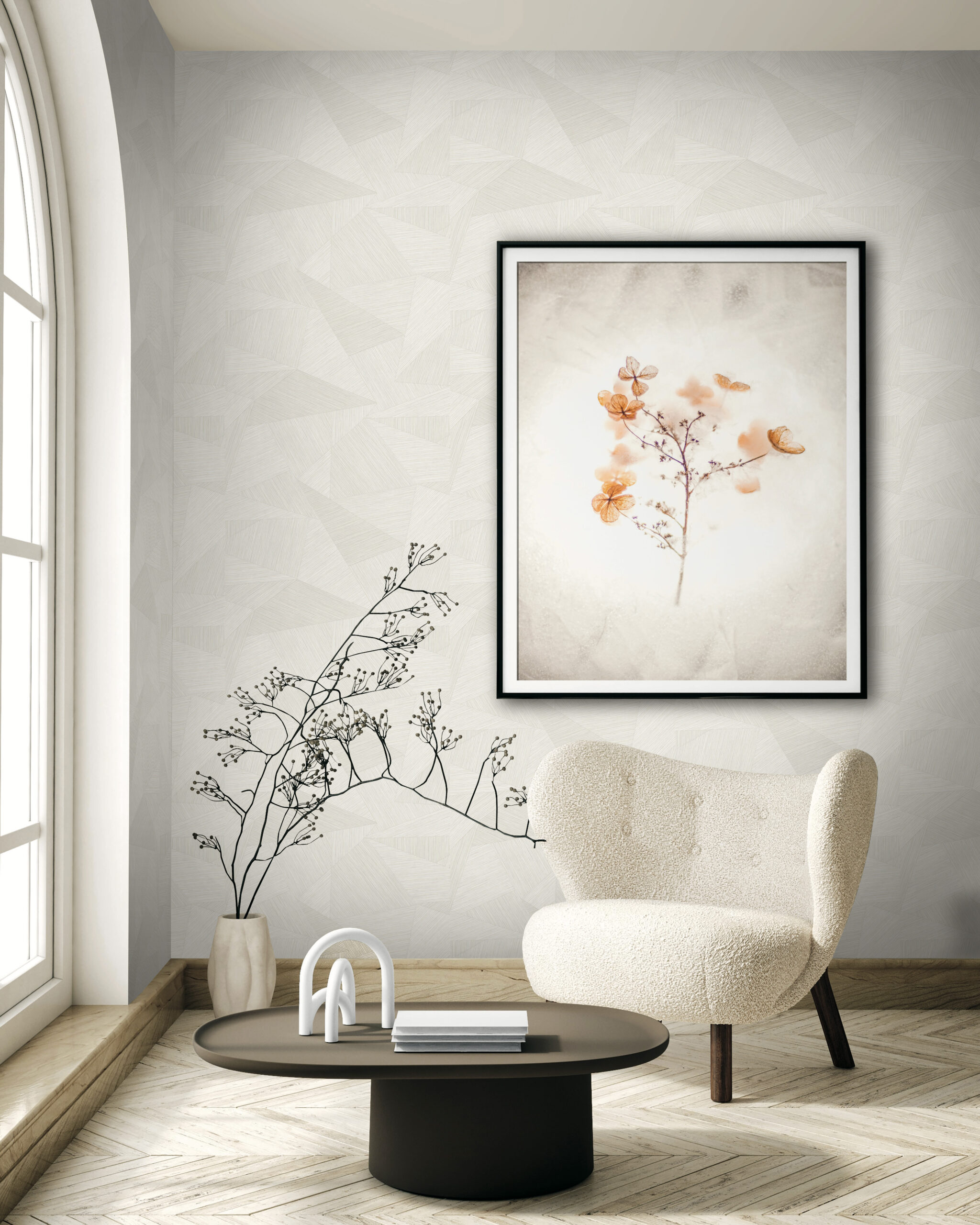Graphic cream wallpaper of random shapes and lines in a soft airy room setting
