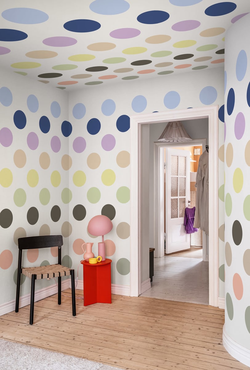 Big Dots wallpaper mural on walls and ceiling. Kids room wallpaper idea for colourful and fun styling