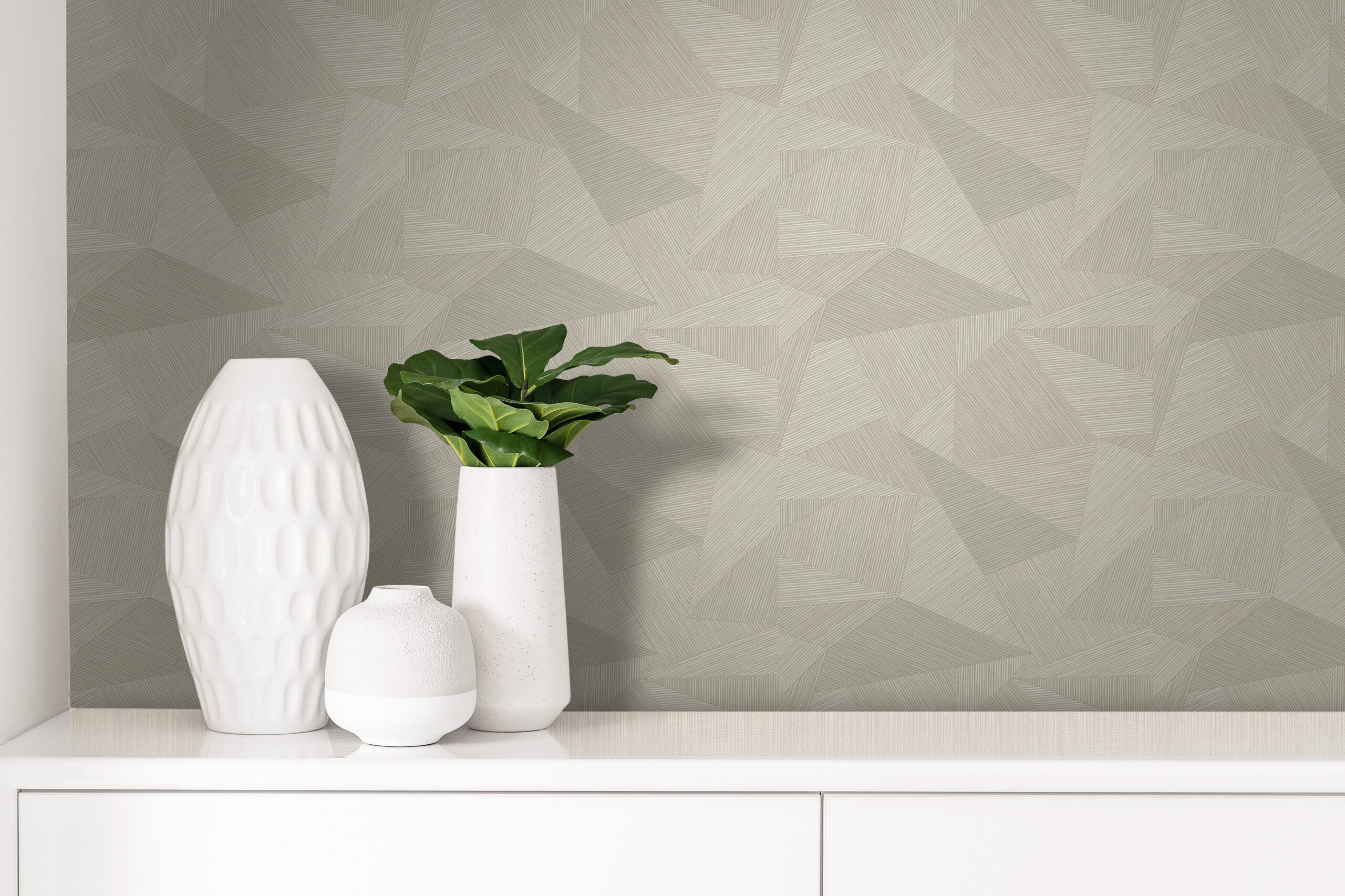 Graphic wallpaper in beige by Casamia as a feature wall