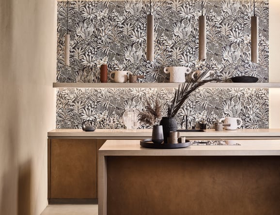 Kitchen featuring a black and white leafy wallpaper design