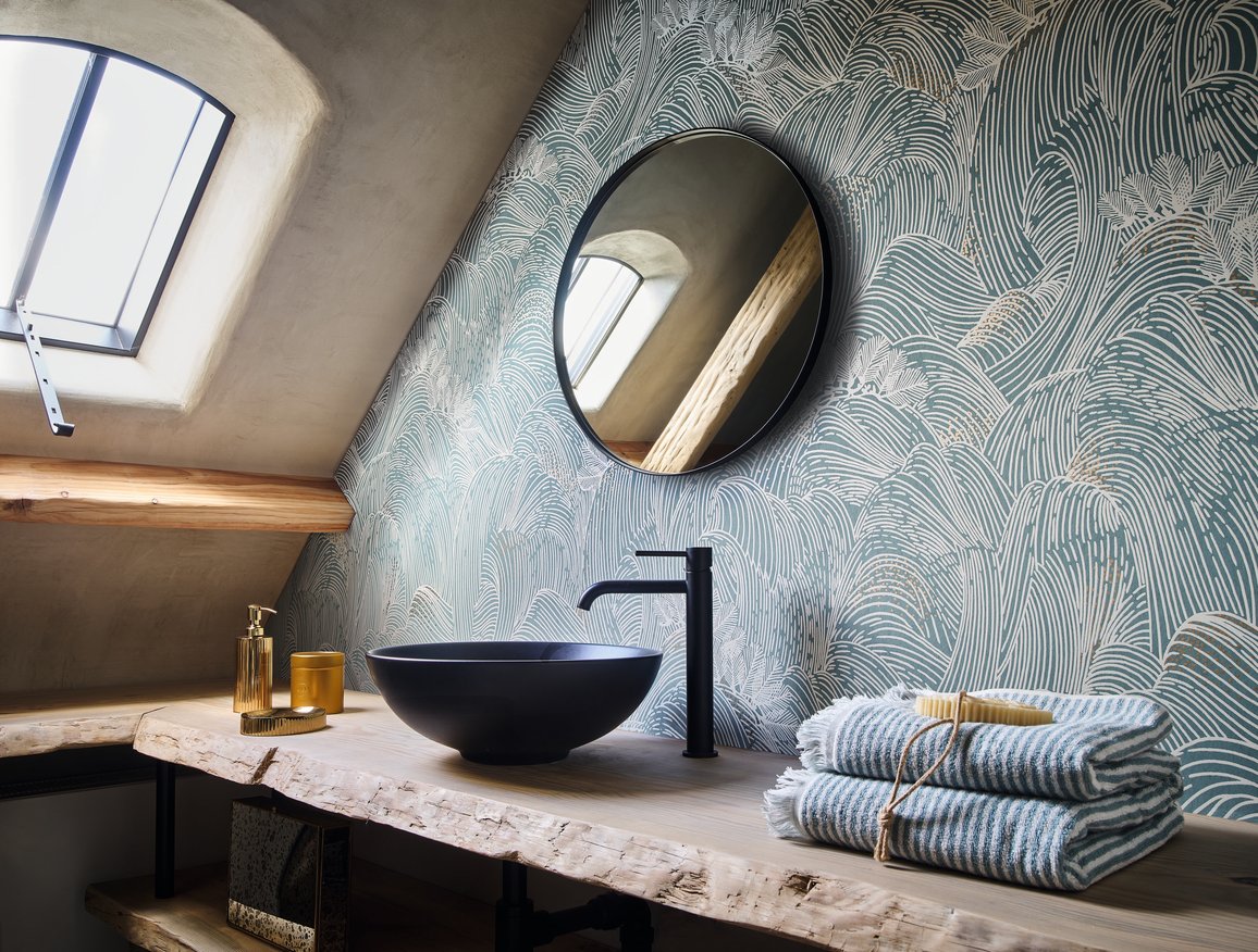Bathroom feauturing blue waves wallpaper