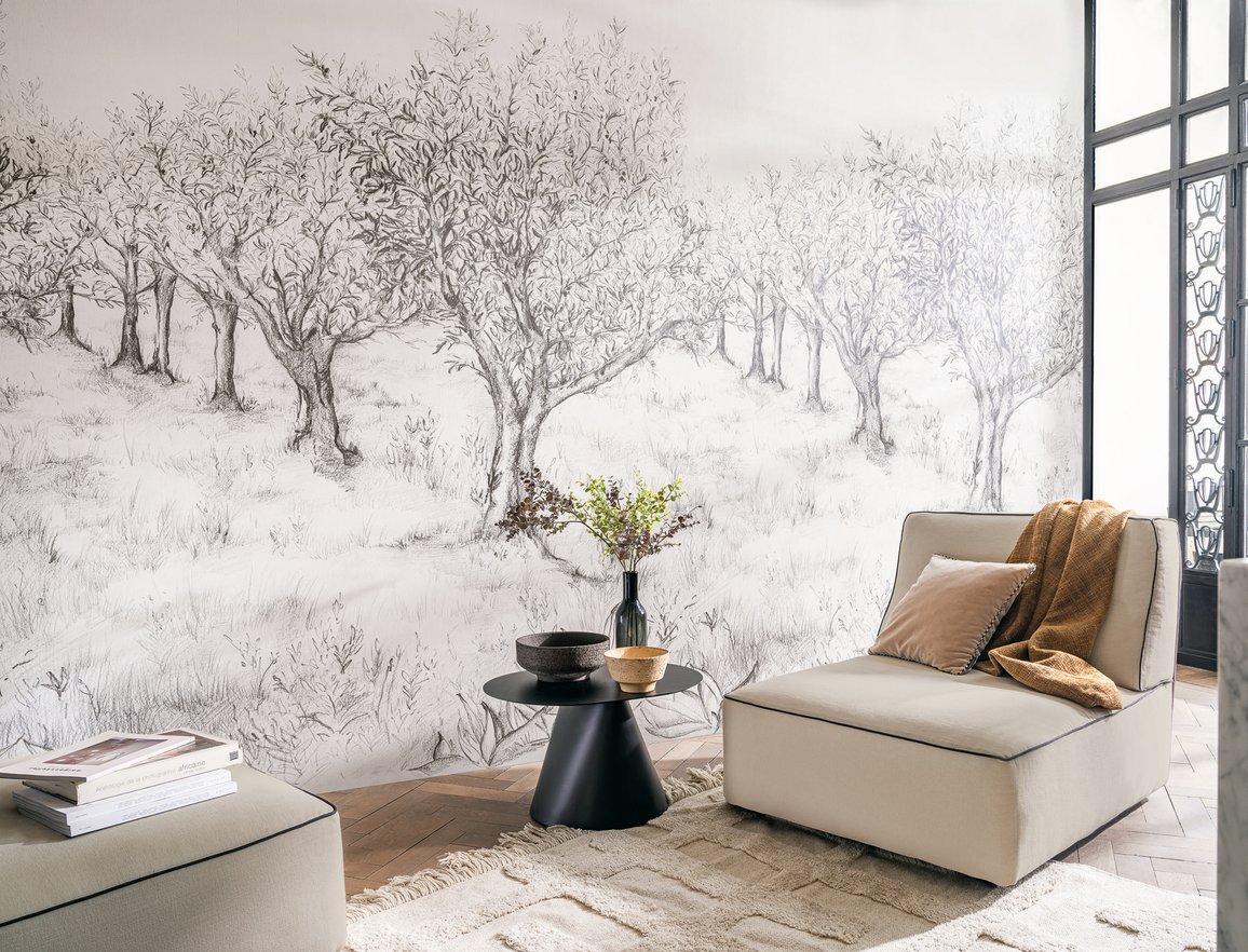 Lauris is an illustrated wallpaper mural that looks like a huge pencil drawing of an orchard