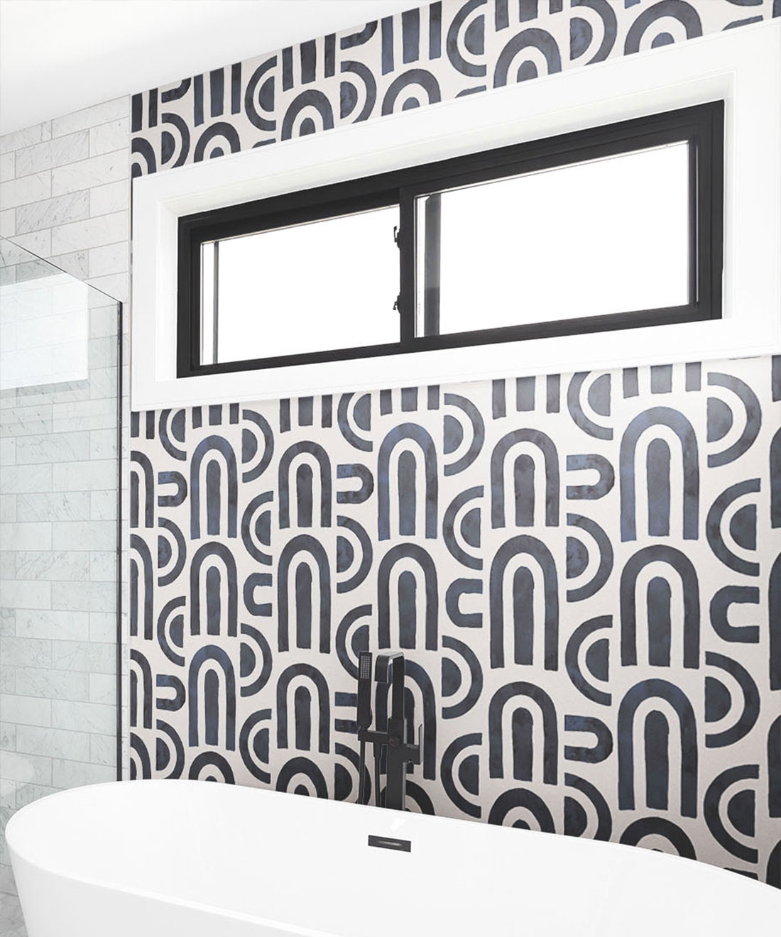 Graphic shapes in monochrome wallpaper in a bathroom