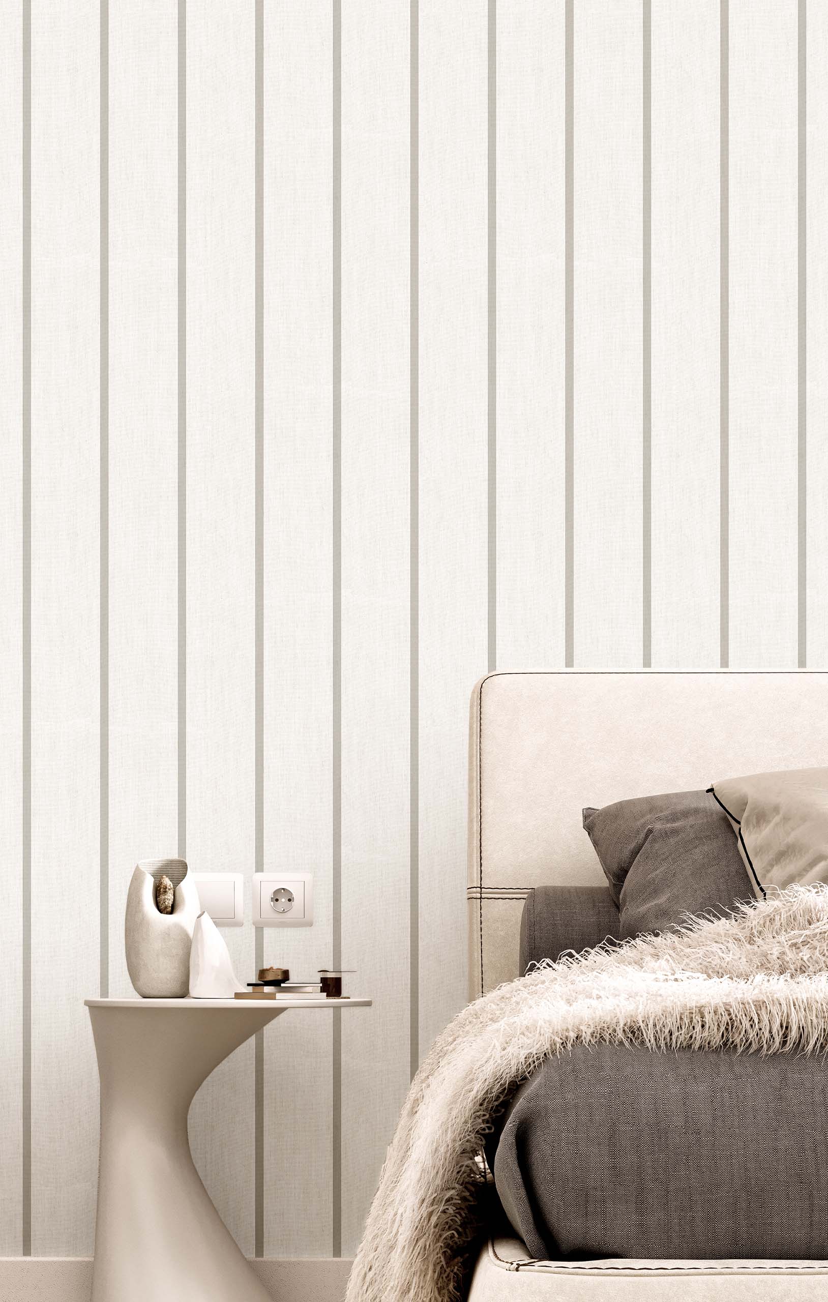 Light silver grey pin striped wallpaper shown in an luxe bedroom