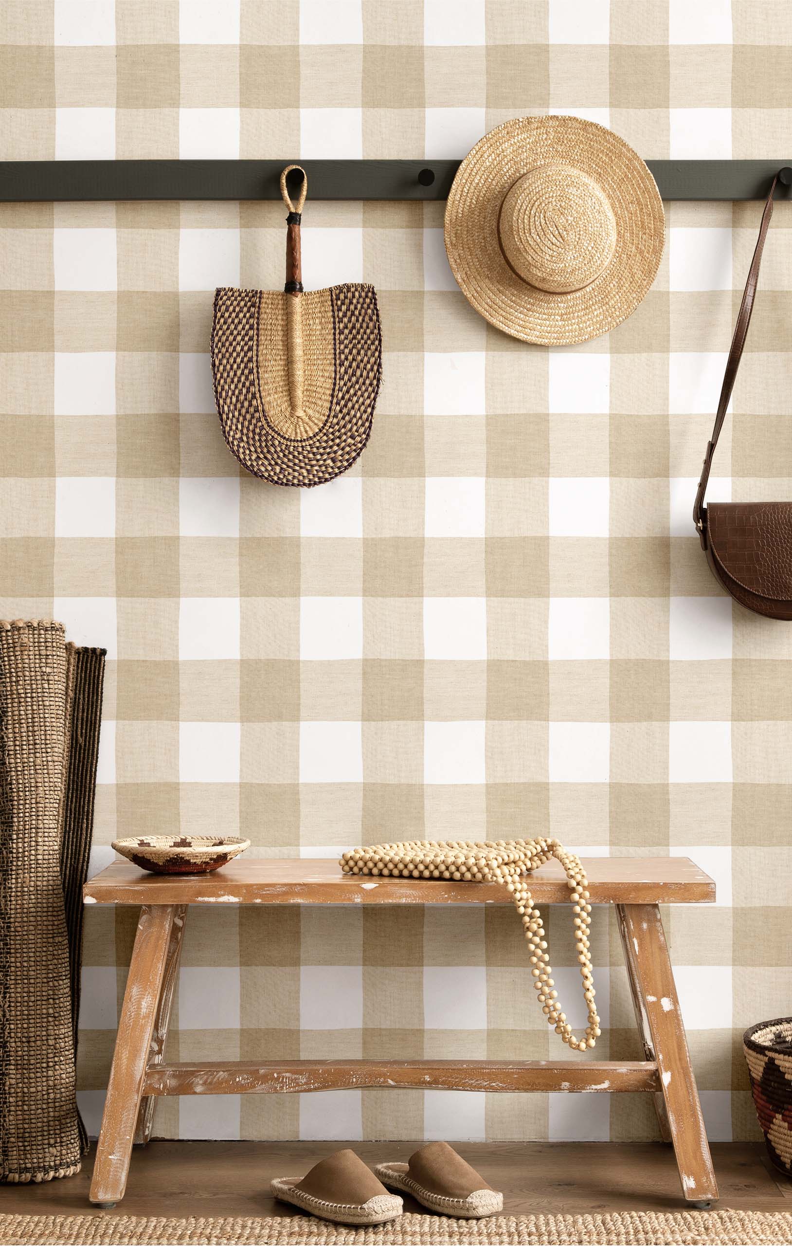 Modern checkered wallpaper in beige featured here in a mud room type setting of a rustic farmhouse.