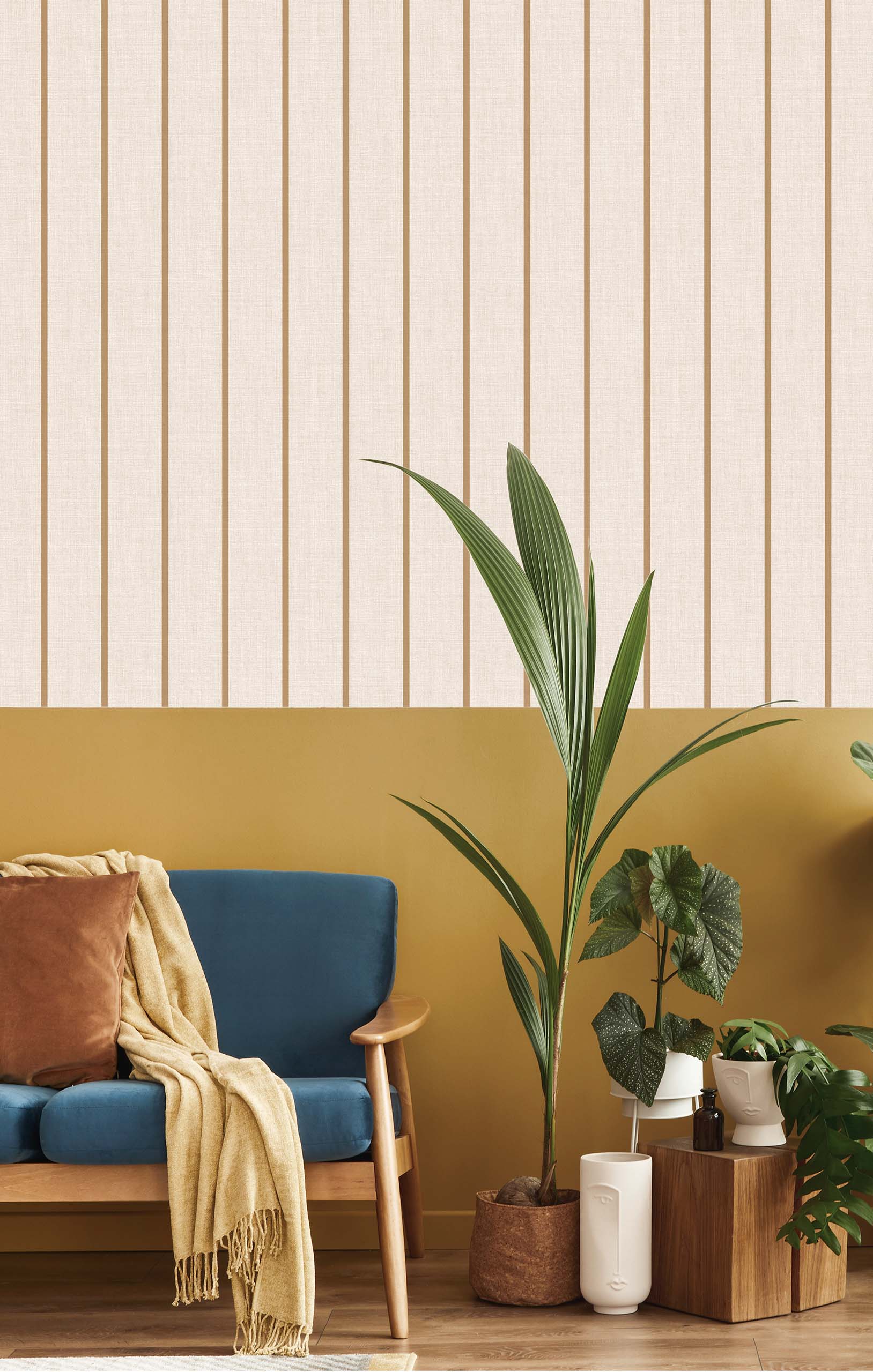 Gold pinstripe details in this sophisticated wallpaper above the gold panel.