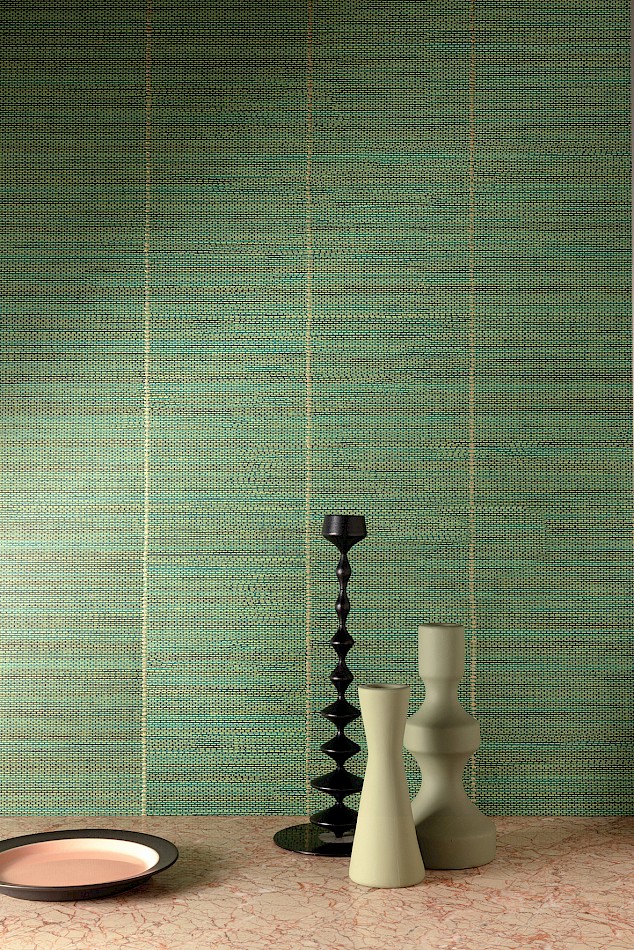 Safia green wallpaper with wide stripe and texture in a styled room shot