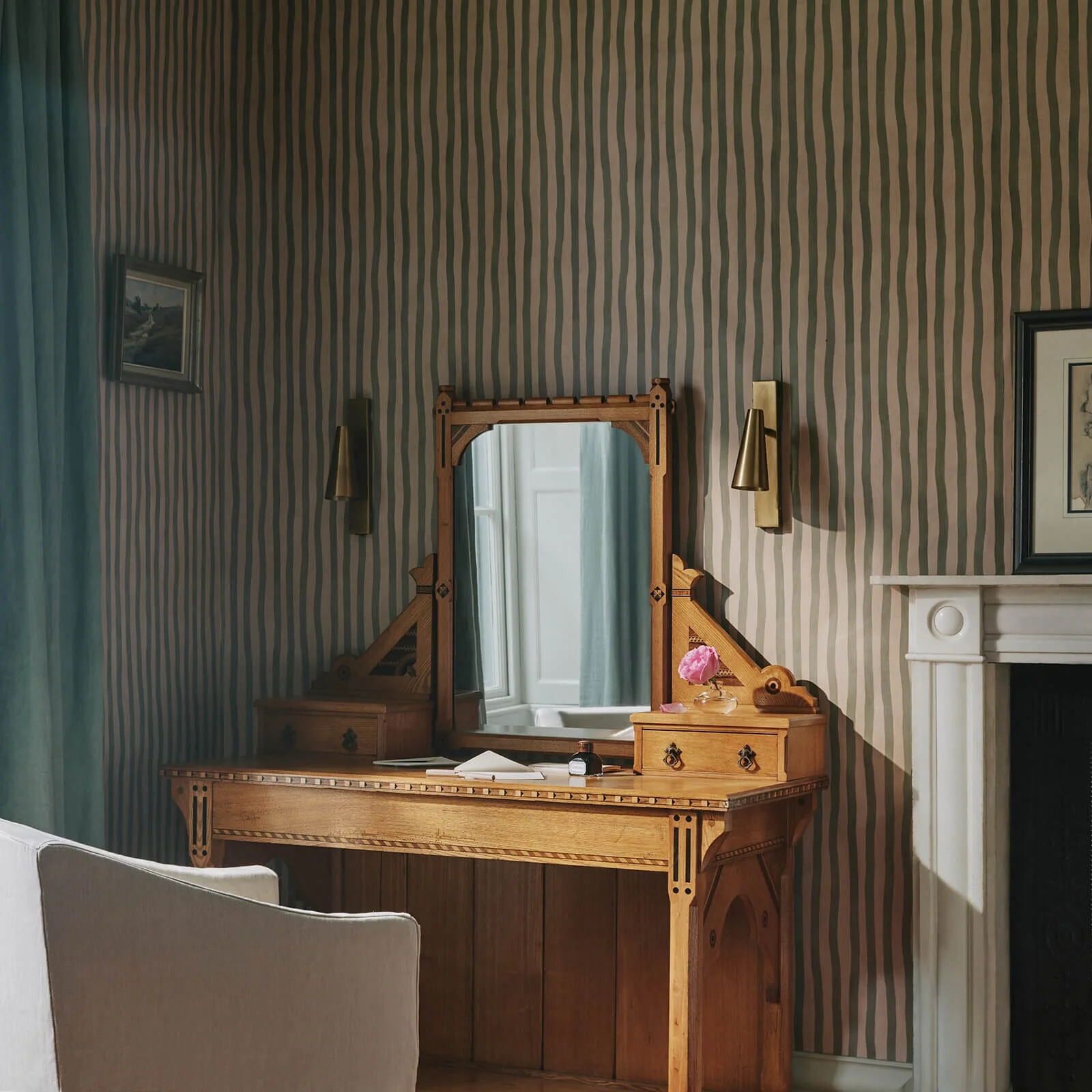 Traditional style room with dressing table and hand painted striped wallpaper