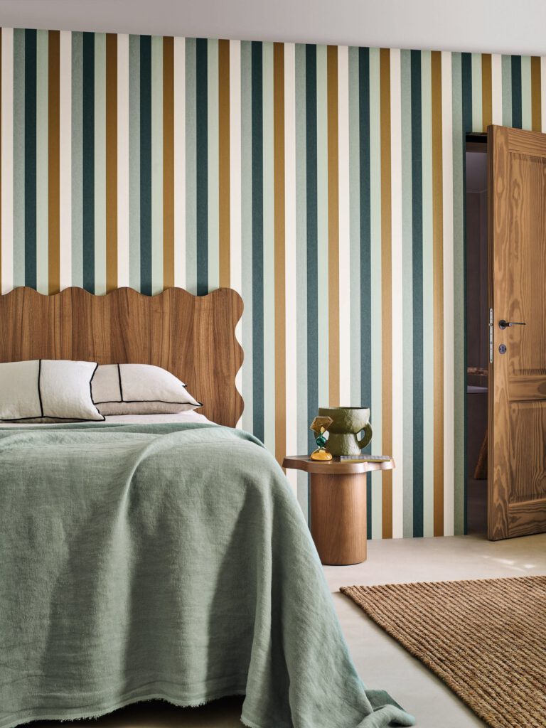 striped Casamance wallpaper in a bedroom