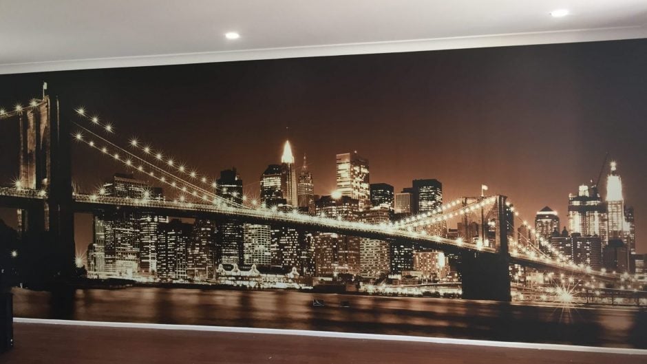 Professional wallpaper installation in progress